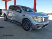 ✅ 2017 Nissan Titan Platinum Reserve • VIN: 1N6AA1E68HN542396 • Lot: 43688877. Listed on IAAI with 124,644 mi. Free auction sales archive from the USA and detailed vehicle history report at DreamBid. Image 1.