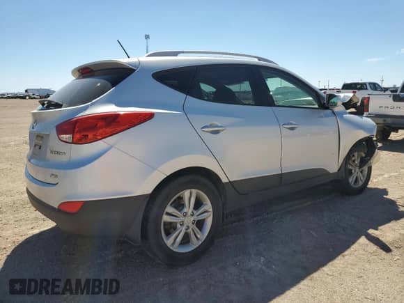 2012 Hyundai Tucson GLS z VIN KM8JUCAC1CU417011, wystawiony jako Copart lot #68081894 z przebiegiem 163 899 mil mil oraz Szkoda całkowita • Salvage title. Historia ofert i sprzedaży dostępna na DreamBid. Obrazek 3.