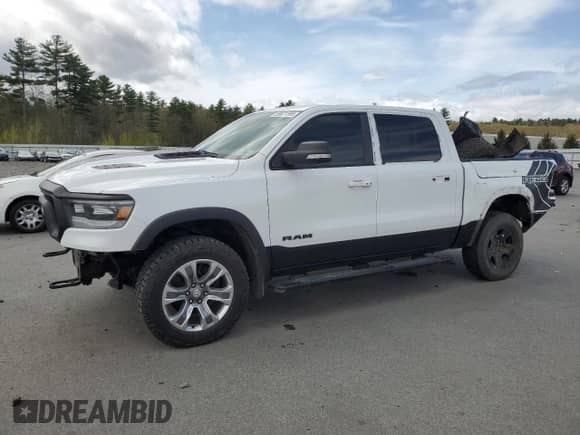2020 Ram 1500 Rebel z VIN 1C6SRFLM1LN230872, wystawiony jako Copart lot #55671585 z przebiegiem 97 202 mil mil oraz Szkoda całkowita • Salvage title. Historia ofert i sprzedaży dostępna na DreamBid. Obrazek 1.
