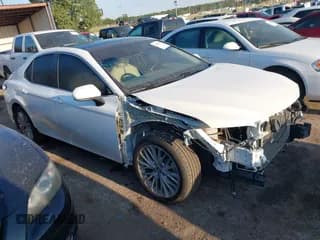 ✅ 2019 Toyota Camry SE • VIN: 4T1B11HK3KU299282 • Lot: 43262697. Listed on IAAI with 59,295 mi. Free auction sales archive from the USA and detailed vehicle history report at DreamBid. Image 1.