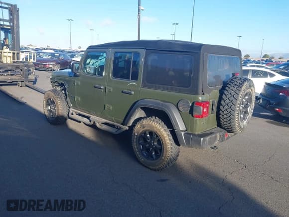 ✅ 2023 Jeep Wrangler Willys Sport • VIN: 1C4HJXDM0PW515898 • Lot: 41419267. Listed on IAAI with 10,964 mi. Free auction sales archive from the USA and detailed vehicle history report at DreamBid. Image 3.