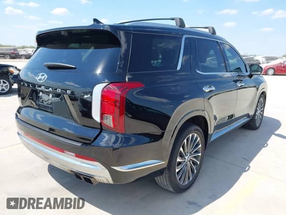 2023 Hyundai Palisade Calligraphy с VIN KM8R74GE2PU561164, выставлен на аукционе IAAI как лот 43333582 с пробегом 55 914 миль миль и . История ставок и продаж доступна на DreamBid. Изображение 4.
