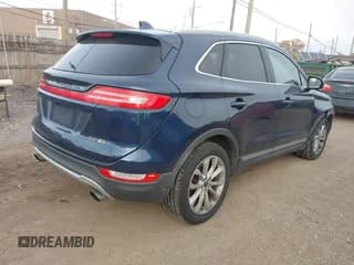 ✅ 2015 Lincoln MKC • VIN: 5LMCJ2A9XFUJ14875 • Lot: 43644849. Listed on IAAI with 203,137 mi. Free auction sales archive from the USA and detailed vehicle history report at DreamBid. Image 4.