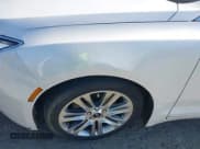 ✅ 2013 Lincoln MKZ Hybrid • VIN: 3LN6L2LU5DR828607 • Lot: 40937392. Wystawiony na IAAI z przebiegiem 144 940 mil. Bezpłatny archiwum sprzedaży aukcyjnych z USA i szczegółowy raport historii pojazdu na DreamBid. Zdjęcie 6.