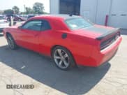 ✅ 2016 Dodge Challenger R/T Plus • VIN: 2C3CDZBT3GH299992 • Lot: 43188443. Listed on IAAI with 57,177 mi. Free auction sales archive from the USA and detailed vehicle history report at DreamBid. Image 3.