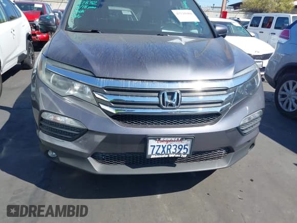 ✅ 2017 Honda Pilot EX-L • VIN: 5FNYF5H59HB030884 • Lot: 43118488. Listed on IAAI with 69,489 mi. Free auction sales archive from the USA and detailed vehicle history report at DreamBid. Image 12.