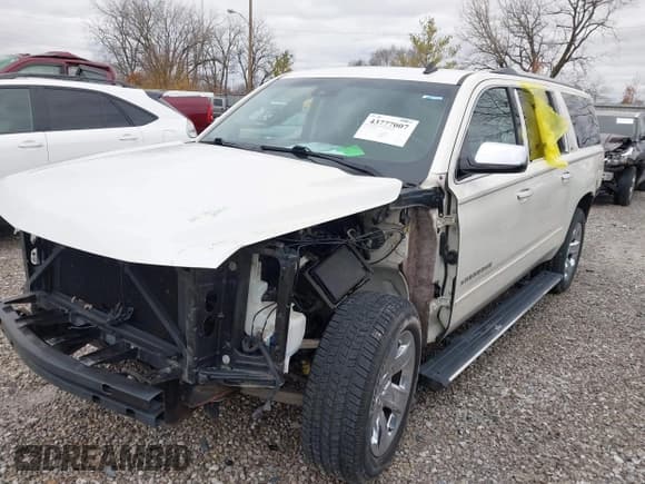 ✅ 2015 Chevrolet Suburban LTZ • VIN: 1GNSKKKC7FR290156 • Lot: 43777007. Listed on IAAI with 145,354 mi. Free auction sales archive from the USA and detailed vehicle history report at DreamBid. Image 23.