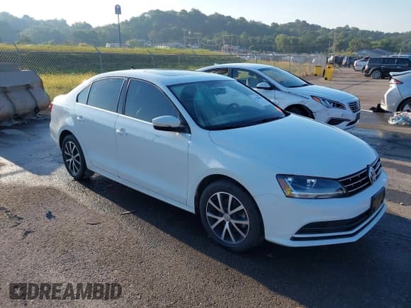 ✅ 2018 Volkswagen Jetta SE • VIN: 3VWDB7AJ8JM261707 • Lot: 43228820. Listed on IAAI with 72,769 mi. Free auction sales archive from the USA and detailed vehicle history report at DreamBid. Image 1.