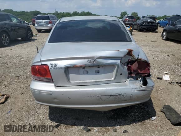 2002 Hyundai Sonata GL с VIN KMHWF25H12A643629, выставлен на аукционе Copart как лот 63307285 с пробегом 158 210 миль миль и Списание • Salvage title. История ставок и продаж доступна на DreamBid. Изображение 6.
