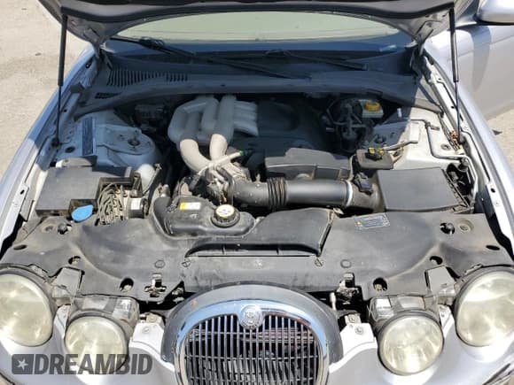 ✅ 2005 Jaguar S-Type • VIN: SAJWA01T05FN38896 • Лот: 59428795. Опубликован ранее на Copart с пробегом 106 917 миль. Бесплатный доступ к архиву аукционных продаж из США и подробный отчёт об истории автомобиля на DreamBid. Изображение 11.