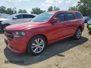 2012 Dodge Durango R/T with VIN 1C4SDJCT6CC138539, listed as a Copart auction lot 60165695 with 148,806 mi miles and Salvage title. Bid and sale history available at DreamBid. Image 1.