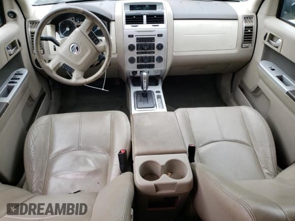 ✅ 2010 Mercury Mariner • VIN: 4M2CN9BG6AKJ17322 • Lot: 61141115. Listed on Copart with 296,537 mi. Free auction sales archive from the USA and detailed vehicle history report at DreamBid. Image 8.