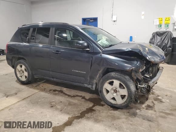 ✅ 2014 Jeep Compass North • VIN: 1C4NJDAB8ED820269 • Lot: 90716185. Listed on Copart with 281,947 mi. Free auction sales archive from the USA and detailed vehicle history report at DreamBid. Image 4.