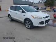 ✅ 2016 Ford Escape SE • VIN: 1FMCU9GX1GUA76589 • Лот: 42014929. Опубликован ранее на IAAI с пробегом 125 294 миль. Бесплатный доступ к архиву аукционных продаж из США и подробный отчёт об истории автомобиля на DreamBid. Изображение 1.