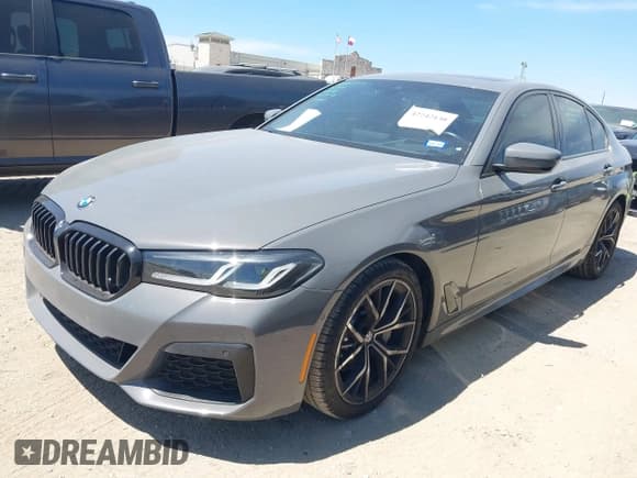 ✅ 2021 BMW 5 Series 530i • VIN: WBA53BH03MWX19966 • Lot: 42242130. Listed on IAAI with 73,716 mi. Free auction sales archive from the USA and detailed vehicle history report at DreamBid. Image 2.
