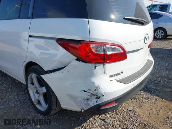 ✅ 2015 Mazda 5 Grand Touring • VIN: JM1CW2DL1F0179038 • Lot: 43200559. Listed on IAAI with 122,100 mi. Free auction sales archive from the USA and detailed vehicle history report at DreamBid. Image 6.