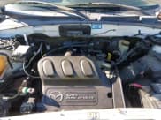 ✅ 2004 Mazda Tribute ES • VIN: 4F2CZ96164KM14997 • Lot: 41190092. Wystawiony na IAAI z przebiegiem 214 278 mil. Bezpłatny archiwum sprzedaży aukcyjnych z USA i szczegółowy raport historii pojazdu na DreamBid. Zdjęcie 10.