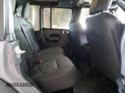 ✅ 2022 Jeep Wrangler Unlimited High Tide • VIN: 1C4HJXDG2NW221829 • Lot: 64836074. Listed on Copart with 3,394 mi. Free auction sales archive from the USA and detailed vehicle history report at DreamBid. Image 10.