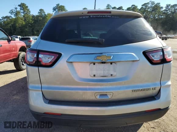 2014 Chevrolet Traverse LS z VIN 1GNKRFED9EJ360504, wystawiony jako Copart lot #89449135 z przebiegiem 158 747 mil mil oraz Szkoda całkowita • Salvage title. Historia ofert i sprzedaży dostępna na DreamBid. Obrazek 6.