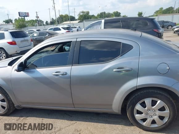 ✅ 2014 Dodge Avenger SE • VIN: 1C3CDZABXEN110199 • Lot: 43157282. Listed on IAAI with 177,058 mi. Free auction sales archive from the USA and detailed vehicle history report at DreamBid. Image 13.