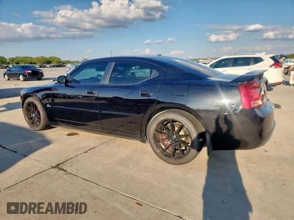 2006 Dodge Charger SRT-8 с VIN 2B3KA73W96H288105, выставлен на аукционе Copart как лот 84009015 с пробегом 83 880 миль миль и Списание • Salvage title. История ставок и продаж доступна на DreamBid. Изображение 2.