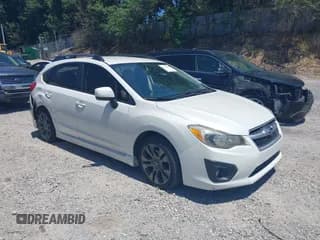 ✅ 2012 Subaru Impreza Special Sports Premium • VIN: JF1GPAL6XCH205904 • Lot: 42769545. Listed on IAAI with 182,194 mi. Free auction sales archive from the USA and detailed vehicle history report at DreamBid. Image 1.