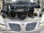 ✅ 2006 Pontiac Montana • VIN: 1GMDV33L66D128136 • Лот: 71961164. Опубликован ранее на Copart с пробегом 217 616 миль. Бесплатный доступ к архиву аукционных продаж из США и подробный отчёт об истории автомобиля на DreamBid. Изображение 12.