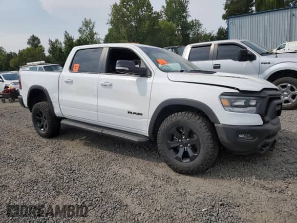 2021 Ram 1500 Rebel z VIN 1C6SRFLT1MN529318, wystawiony jako Copart lot #67312665 z przebiegiem Nie podano mil oraz Szkoda całkowita • Salvage title. Historia ofert i sprzedaży dostępna na DreamBid. Obrazek 4.