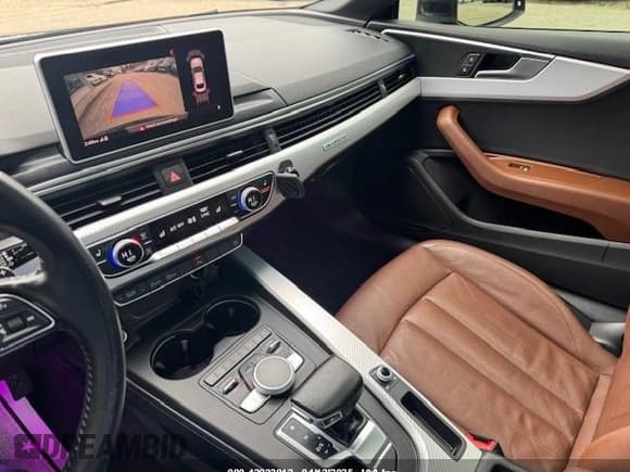 ✅ 2018 Audi A5 Premium Plus • VIN: WAUPNAF50JA002963 • Лот: 42033812. Опубликован ранее на IAAI с пробегом 173 092 миль. Бесплатный доступ к архиву аукционных продаж из США и подробный отчёт об истории автомобиля на DreamBid. Изображение 10.