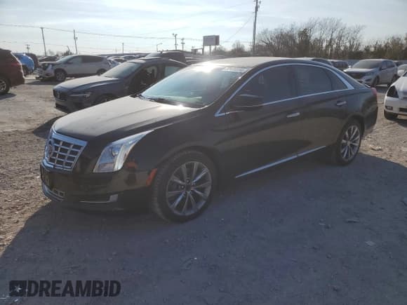 ✅ 2013 Cadillac XTS Livery • VIN: 2G61W5S35D9104554 • Lot: 82926694. Listed on Copart with 232,449 mi. Free auction sales archive from the USA and detailed vehicle history report at DreamBid. Image 1.
