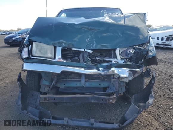 ✅ 2000 Nissan Frontier XE • VIN: 1N6DD26S9YC409275 • Lot: 89993095. Wystawiony na Copart z przebiegiem 271 277 mil. Bezpłatny archiwum sprzedaży aukcyjnych z USA i szczegółowy raport historii pojazdu na DreamBid. Zdjęcie 5.