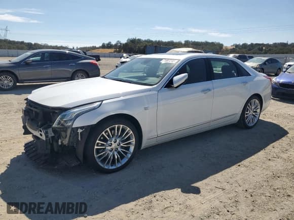 ✅ 2016 Cadillac CT6 Premium Luxury AWD • VIN: 1G6KG5R67GU144871 • Лот: 71861245. Опубликован ранее на Copart с пробегом 69 278 миль. Бесплатный доступ к архиву аукционных продаж из США и подробный отчёт об истории автомобиля на DreamBid. Изображение 1.