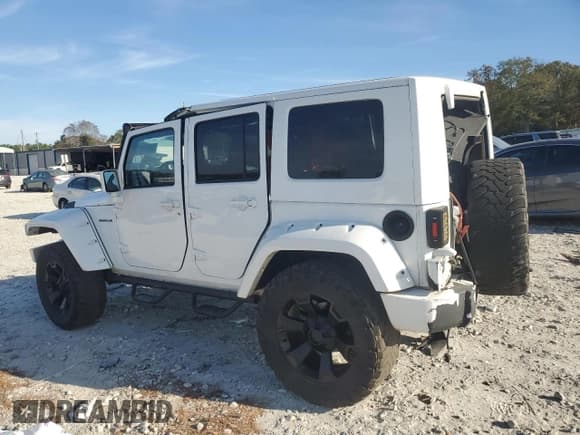 ✅ 2007 Jeep Wrangler Unlimited Sahara • VIN: 1J4GB59117L143155 • Lot: 92919195. Listed on Copart with Not provided. Free auction sales archive from the USA and detailed vehicle history report at DreamBid. Image 2.