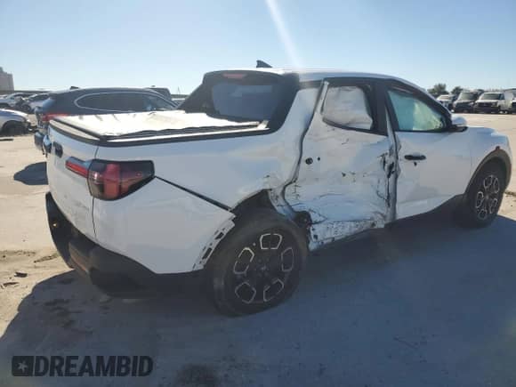 2022 Hyundai Santa Cruz SEL z VIN 5NTJBDAE3NH031402, wystawiony jako Copart lot #81236024 z przebiegiem 48 156 mil mil oraz Szkoda całkowita • Salvage title. Historia ofert i sprzedaży dostępna na DreamBid. Obrazek 3.