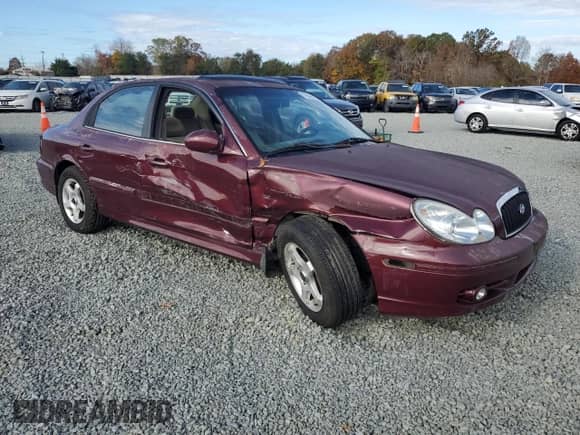 2002 Hyundai Sonata with VIN KMHWF25H82A602530, listed as a Copart auction lot 79468914 with Not provided miles and Salvage title. Bid and sale history available at DreamBid. Image 4.