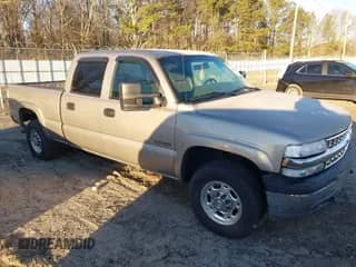 2002 Chevrolet Silverado 1500HD LT z VIN 1GCGK13U22F106947, wystawiony jako IAAI lot #41355023 z przebiegiem 99 073 mil mil oraz . Historia ofert i sprzedaży dostępna na DreamBid. Obrazek 1.