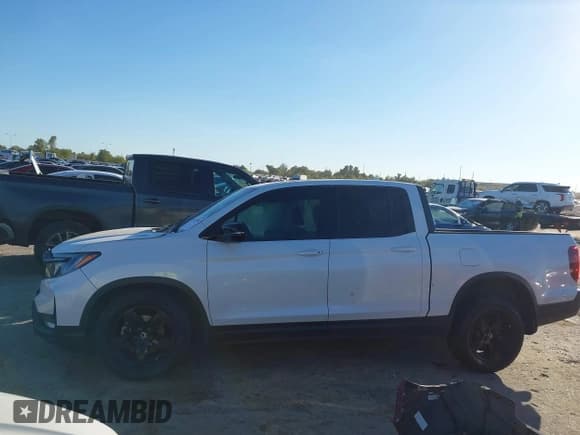 ✅ 2022 Honda Ridgeline Black Edition • VIN: 5FPYK3F88NB034232 • Lot: 43619502. Listed on IAAI with Not provided. Free auction sales archive from the USA and detailed vehicle history report at DreamBid. Image 14.