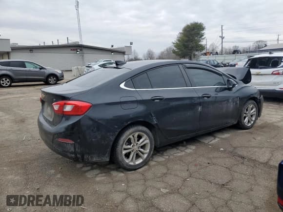 ✅ 2019 Chevrolet Cruze LT • VIN: 1G1BE5SM4K7144452 • Lot: 40571503. Listed on Copart with 96,115 mi. Free auction sales archive from the USA and detailed vehicle history report at DreamBid. Image 3.