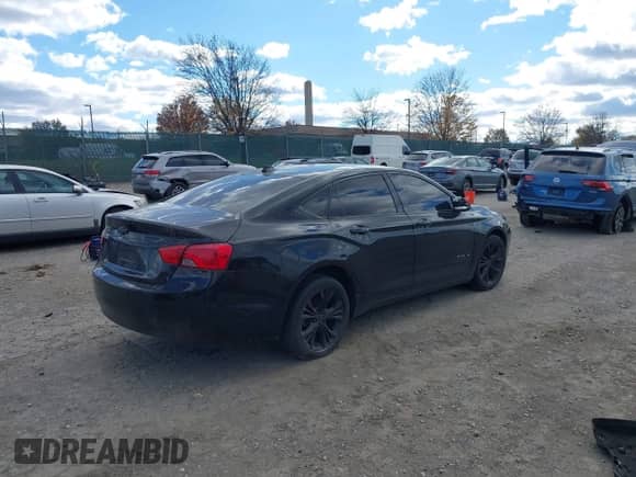 ✅ 2014 Chevrolet Impala LT • VIN: 1G1115SL9EU138635 • Lot: 43588430. Listed on IAAI with 106,131 mi. Free auction sales archive from the USA and detailed vehicle history report at DreamBid. Image 4.