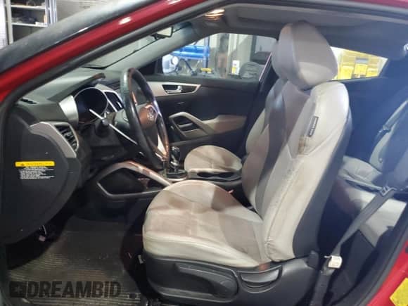 ✅ 2013 Hyundai Veloster RE:MIX • VIN: KMHTC6AD9DU140289 • Лот: 59853575. Размещён на Copart с пробегом 105 043 миль миль. Получите бесплатный доступ к архиву аукционных продаж из США и посмотрите подробный отчёт об истории автомобиля на DreamBid. Изображение 7.