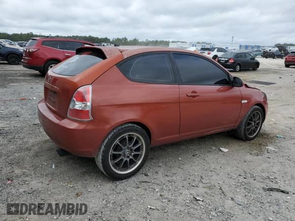2007 Hyundai Accent GS z VIN KMHCM36C97U025420, wystawiony jako Copart lot #81454784 z przebiegiem 183 192 mil mil oraz Szkoda całkowita • Salvage title. Historia ofert i sprzedaży dostępna na DreamBid. Obrazek 3.