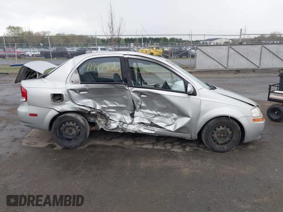 ✅ 2005 Chevrolet Aveo LS • VIN: KL1TD526X5B324267 • Lot: 41947906. Listed on IAAI with 180,204 mi. Free auction sales archive from the USA and detailed vehicle history report at DreamBid. Image 13.