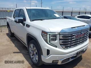 ✅ 2023 GMC Sierra 1500 Denali • VIN: 1GTUUGE86PZ110599 • Лот: 42702107. Опубликован ранее на IAAI с пробегом 42 125 миль. Бесплатный доступ к архиву аукционных продаж из США и подробный отчёт об истории автомобиля на DreamBid. Изображение 1.