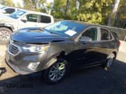 ✅ 2021 Chevrolet Equinox LT • VIN: 2GNAXJEVXM6151801 • Lot: 43462120. Listed on IAAI with 99,944 mi. Free auction sales archive from the USA and detailed vehicle history report at DreamBid. Image 14.