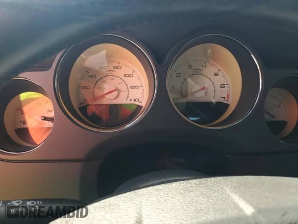 2013 Dodge Challenger SXT z VIN 2C3CDYAG5DH736384, wystawiony jako Copart lot #86122405 z przebiegiem Nie podano mil oraz Szkoda całkowita • Salvage title. Historia ofert i sprzedaży dostępna na DreamBid. Obrazek 9.