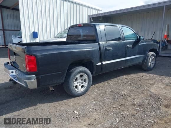 2006 Dodge Dakota SLT with VIN 1D7HE48NX6S596684, listed as a IAAI auction lot 41992956 with 255,526 mi miles and . Bid and sale history available at DreamBid. Image 4.
