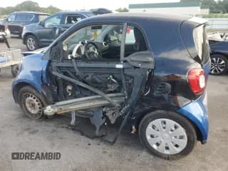 ✅ 2016 Smart fortwo Passion • VIN: WMEFJ5DA0GK076339 • Лот: 68891564. Опубликован ранее на Copart с пробегом Не указан. Бесплатный доступ к архиву аукционных продаж из США и подробный отчёт об истории автомобиля на DreamBid. Изображение 2.