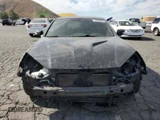 2013 Hyundai Genesis Coupe R-Spec z VIN KMHHU6KJ5DU104090, wystawiony jako Copart lot #77754234 z przebiegiem 100 939 mil mil oraz Szkoda całkowita • Salvage title. Historia ofert i sprzedaży dostępna na DreamBid. Obrazek 5.