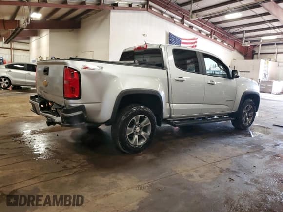 ✅ 2016 Chevrolet Colorado 4WD Z71 • VIN: 1GCGTDE34G1383218 • Лот: 80271115. Опубликован ранее на Copart с пробегом 164 907 миль. Бесплатный доступ к архиву аукционных продаж из США и подробный отчёт об истории автомобиля на DreamBid. Изображение 3.
