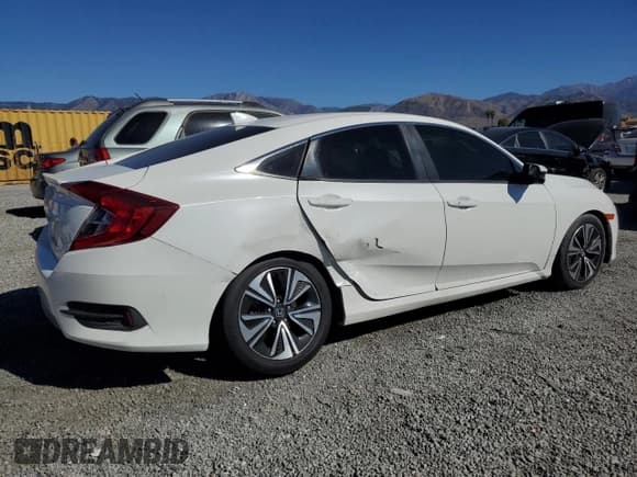 ✅ 2018 Honda Civic EX-T • VIN: JHMFC1F34JX035995 • Lot: 82781945. Wystawiony na Copart z przebiegiem 149 233 mil. Bezpłatny archiwum sprzedaży aukcyjnych z USA i szczegółowy raport historii pojazdu na DreamBid. Zdjęcie 3.